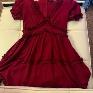 Burgundy/Red low cut dress.